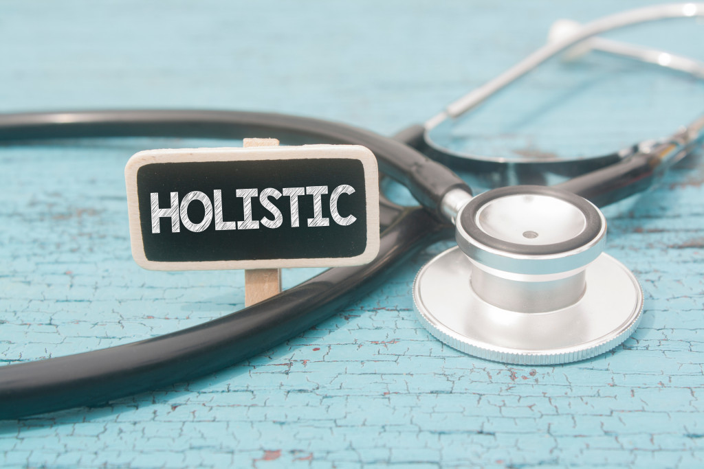 stethoscope with holistic word