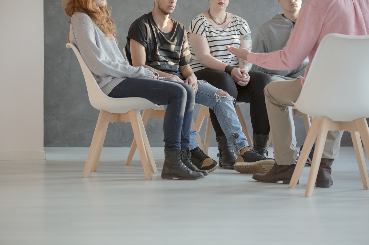 a group on a meeting for support